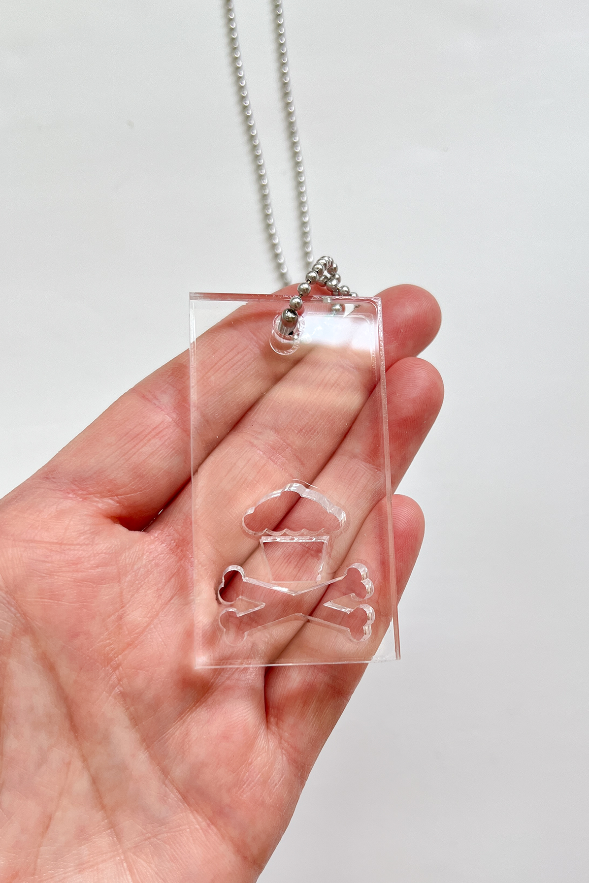 JC Vault - Large Crossbones Acrylic Pendant Necklace (Clear)
